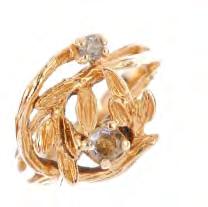 100-150 388 A selection of three 18ct gold gemset rings.