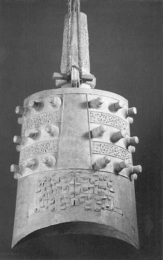Figure 3a. A bell-chime of 26 bronze bells, c. 550 B.C., Xichaun, Henan Province; each plays two notes. Figure 3b.