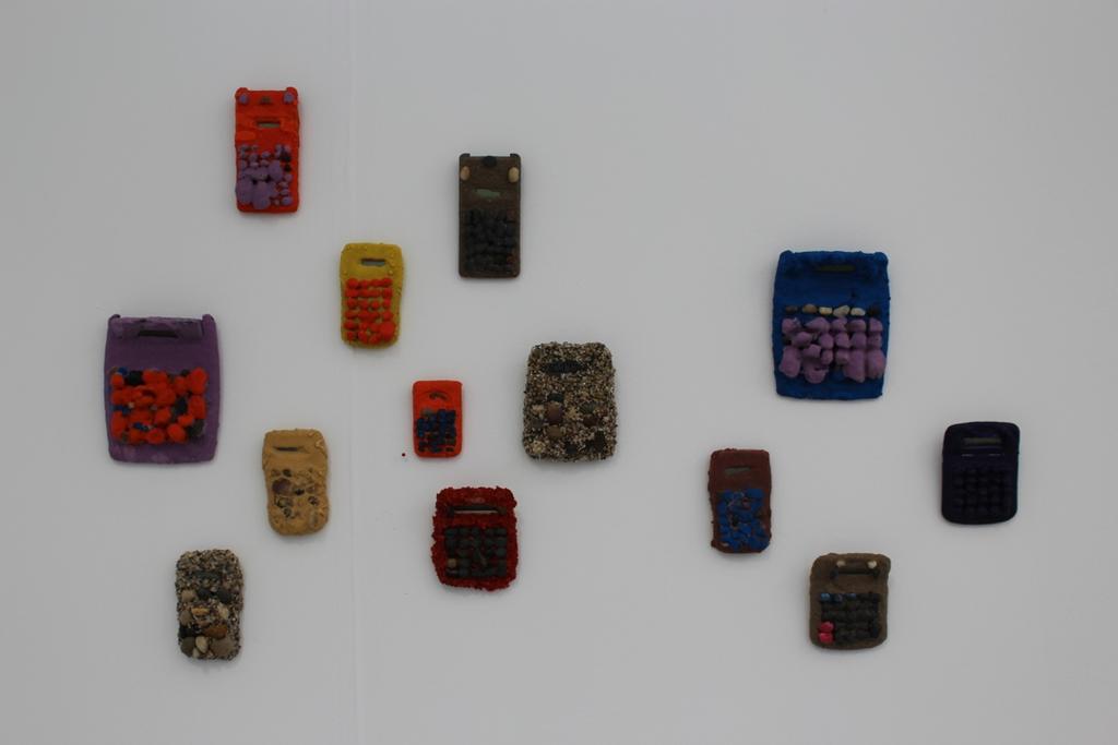 Zürcher Gallery of New York displayed calculators by Brian Belott that looked as if they had washed ashore, coated in barnacles and sandy pebbles.