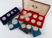 A group of seven 1970s commonwealth silver proof style coins and medallions, presented in boxes, card and capsules and one in book, some with certificates (7)