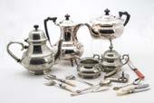 pearl fruit knife, a three piece tea set, plated spoons along with a pewter three piece tea