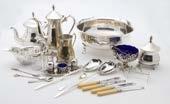 A collection of silver plated items, together with a small George V silver cream jug, 2.
