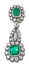 18 18 AN EMERALD AND DIAMOND NECKLACE, BROOCH, EARRING AND RING SUITE The emerald and diamond cluster necklace suspending a detachable emerald and diamond quatrefoil brooch/pendant, accompanied by an