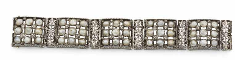 0cm 6,000-7,000 US$9,300-11,000 26 A SILVER, GOLD AND BLISTER PEARL BRACELET, BY BUCCELLATI, CIRCA 1930 Composed of five openwork engraved panels, each set with nine blister pearls, connected by