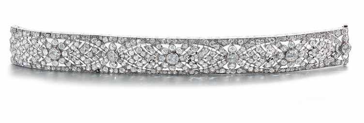 39 40 39 A DIAMOND STRAP BRACELET, CIRCA 1950 Designed as an articulated colonnade of old brilliant, brilliant and singlecut diamond links, each principal diamond to the centre within a pierced