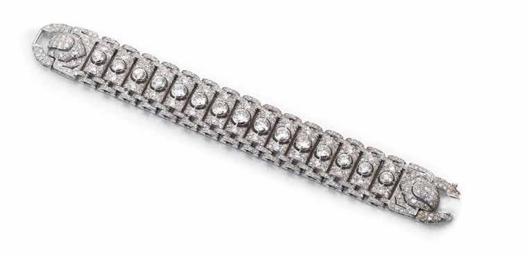 3cm, cased 8,000-10,000 US$12,000-15,000 40 AN ART DECO DIAMOND PANEL BRACELET, FRENCH, CIRCA 1930 The articulated openwork strap designed as three elliptical panels with central flowerhead