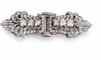 59 60 61 59 AN ART DECO DIAMOND DOUBLE-CLIP/BROOCH, BY LACLOCHE FRÈRES, CIRCA 1930 Each openwork scrolling clip set throughout with old brilliant, brilliant, square, baguette and single-cut diamonds,