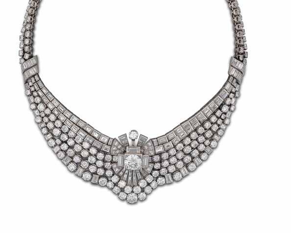62 63 62 A DIAMOND COLLAR NECKLACE, CIRCA 1950 The central radiating plaque, with a principal old brilliant-cut diamond, between diamond swags, connected to a double-row back-chain via diamond