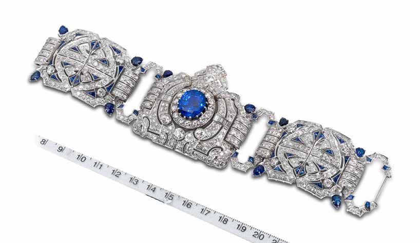 67 68 67 A SAPPHIRE AND DIAMOND BRACELET The wide cuff designed as three geometric plaques, connected by buckle-shaped links, pierced and millegrain-set throughout with old brilliant, brilliant,