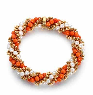5cm 4,000-6,000 US$6,200-9,300 70 Y A CULTURED PEARL AND CORALLIUM RUBRUM TWIST BRACELET, BY VAN CLEEF & ARPELS, CIRCA 1965 Designed as twisted strands of cultured pearls and coral beads, intertwined