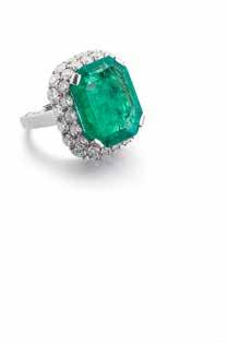 85 85 AN EMERALD AND DIAMOND RING, BY BULGARI The octagonal step-cut emerald, weighing 17.