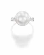 131 (actual size) 131 A NATURAL PEARL AND DIAMOND RING, BY BULGARI The natural pearl, measuring approximately 12.