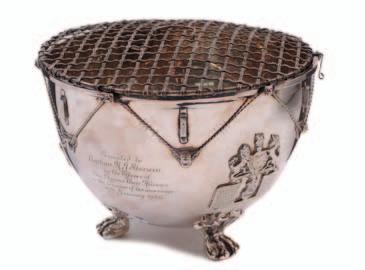 17. An Elizabeth II presentation rose bowl in the form of a regimental kettle drum, with presentation inscription to Captain M. J.