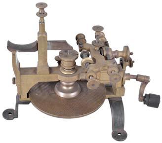 hardware, screw feed adjustment for positioning cutting spindle, 5.25 inch diameter brass dividing plate with 30 rows of holes, the counts ranging from 11 to 360, 19th century. $800-$1000 8.75in x 6.