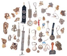 Railroad related pins, fobs, and buttons, all 10 karat gold, and with enamel, including Brotherhood Railway Carmen, Ladies Auxiliary to the Brotherhood of Railway Trainmen,