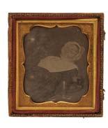 post mortem portrait of an elderly woman, the reclining figure next to a table with wine glass, glass bowl with fruit, and two medicine bottles, contained in an embossed, velvet lined case 610