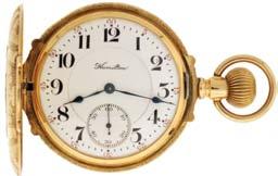 numeral, double sunk white enamel dial, plum colored steel spade and poker hands, serial #5441567, c1930. $1800-$2500 1038 American Waltham Watch Co,