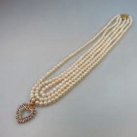 289 TRIPLE STRAND FRESHWATER PEARL NECKLACE with a 14k yellow gold