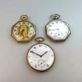 333 LONGINES FOB WATCH 15 jewel movement; porcelain dial; in an ornate 14k yellow gold case set with a