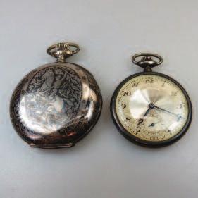 with a 17 jewel movement adjusted to temperature and 3 positions; an octagonal cased Genex with a 17