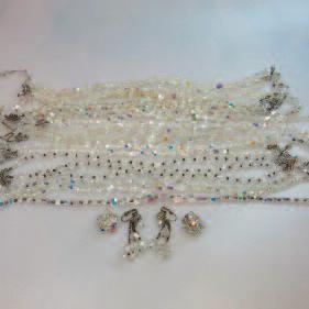 ambroid beads; 2 gold bands; and costume jewellery 63 SMALL QUANTITY OF
