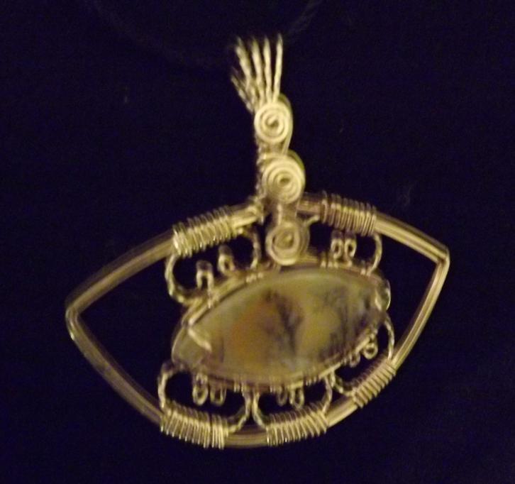 #15. Doris Keane has fashioned a pendant from gold-filled wire wrapped around a