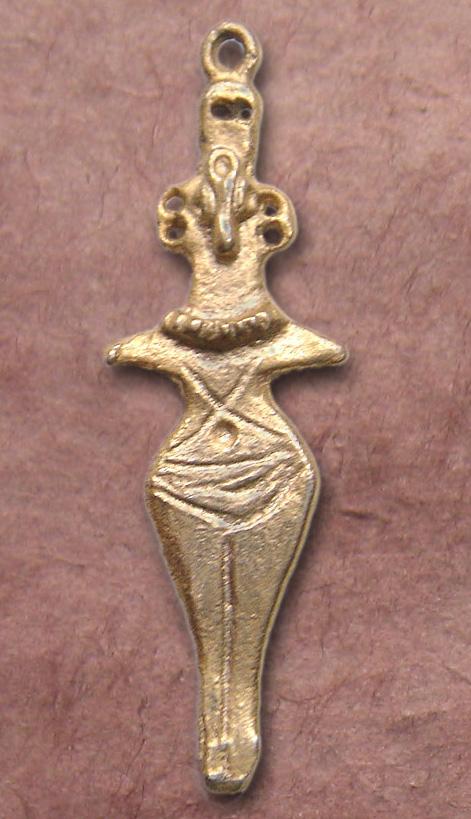 FEMALE FIGURINE PENDANTS Material: 18k yellow gold These two pendants feature a female figurine and a mother and children motif in