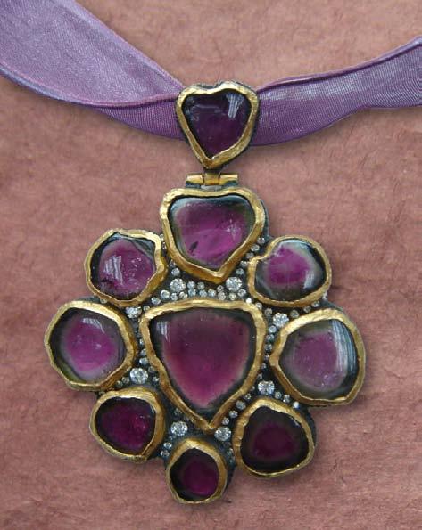 This beautiful piece comes with a matching purple silk ribbon. Tourmaline is a virtually unique color miracle with purple and green shades.