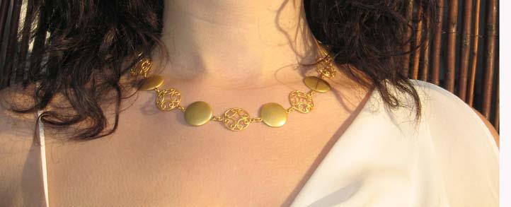 PELTA NECKLACE Material: 18k yellow gold Weight: approx. 50.