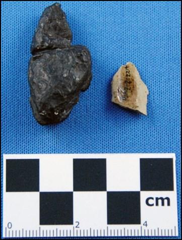 Figure 18. Maritime Archaic Indian plummet (l) and tool fragment (r) from Anstey.