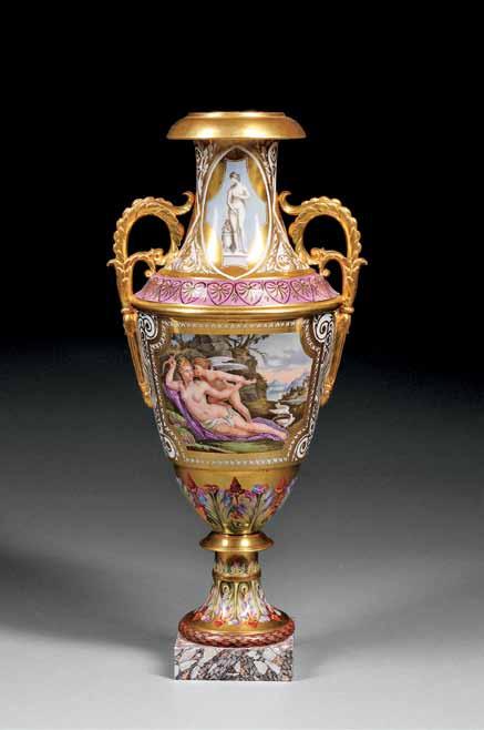 589 Paris Porcelain Hand-painted and Gilded Vase, France, mid-19th century, urn-form, with two handles, the white ground overlaid with gilded arabesques and strapwork, the neck with depictions of