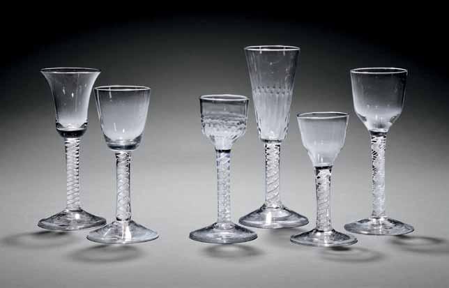 664 665 664 Two Single-series Opaque-twist Wineglasses, England, 1760-70, each with outlined multi-ply corkscrew to stem and conical foot, one with waisted bell bowl with solid base, ht.