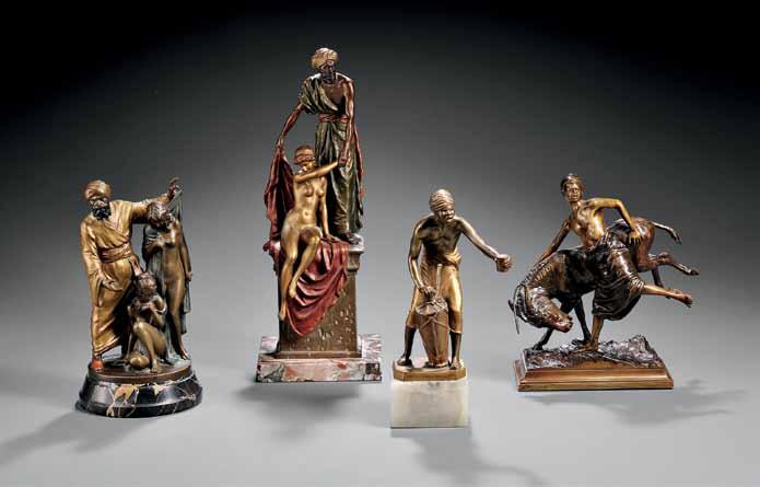 701 700 702 703 700 After Josef Lorenzl (Austrian, 1892-1950) Cold-painted Bronze Figure of a Arab with Two Nude Maidens, cast as an robed gentleman lifting the robes off a standing nude with another
