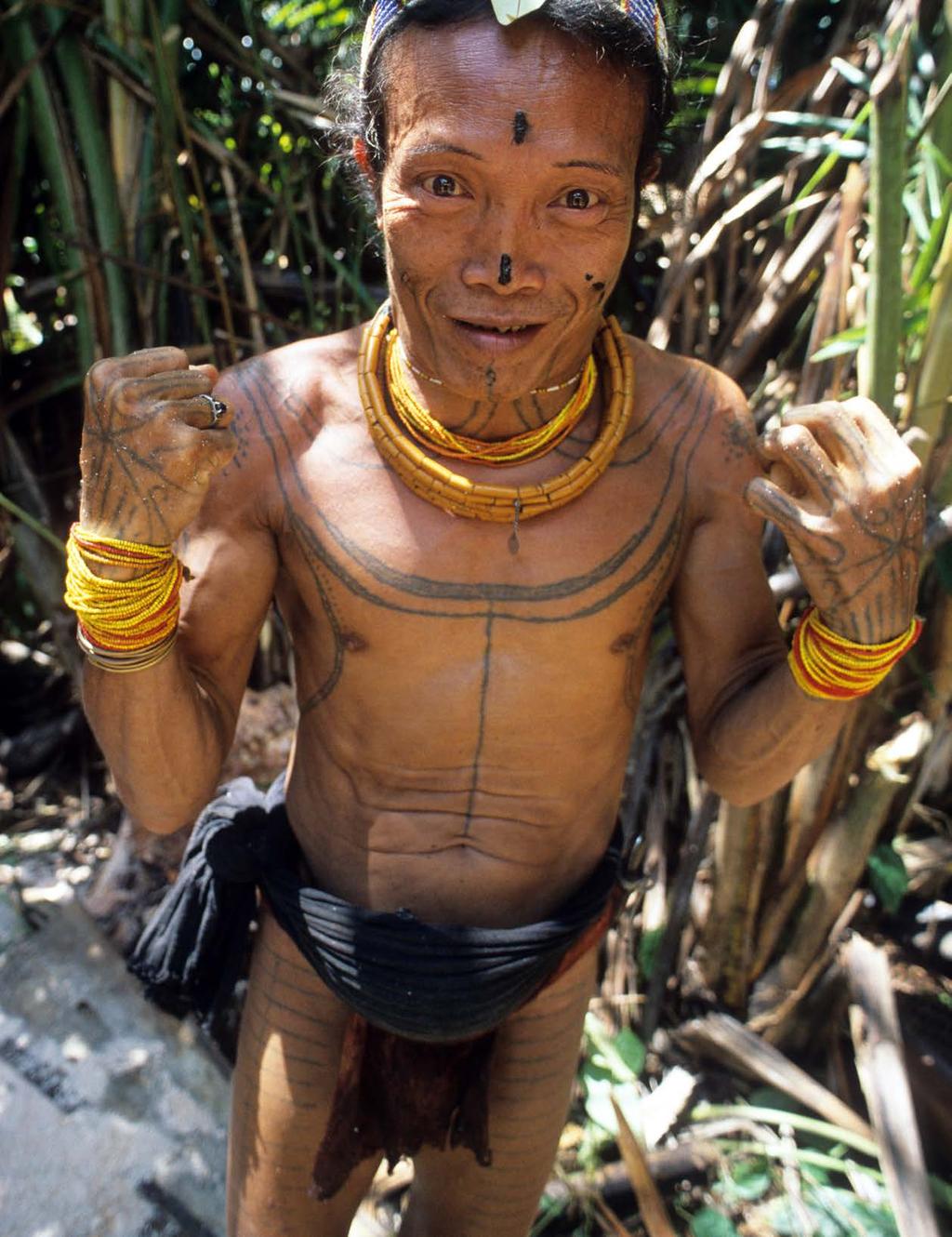 Mentawai shaman Aman Lau Lau of the Butui clan beautifies himself every day as part of his spiritual practice.