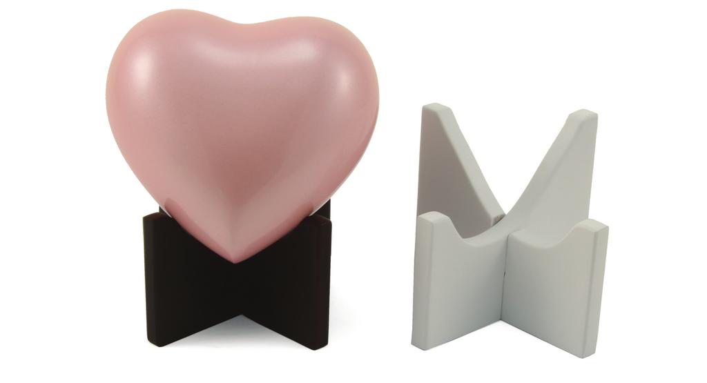The large cherry and white heart stands are made specifically to hold Arielle Hearts while the small cherry stand holds all other metal and cloisonné Heart