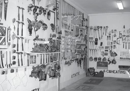This crude but effective inventory system, where a picture of the tool is painted on the wall, allows correctional officers to see at a