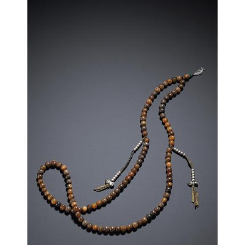 Rhinoceros Horn Carvings from The Edward Hong Kong 08 Apr 2011, 10:00 AM HK0370 LOT 2725 A STRAND OF RHINOCEROS HORN TIBETAN ROSARY BEADS QING DYNASTY, 19TH CENTURY consisting of 108 circular beads
