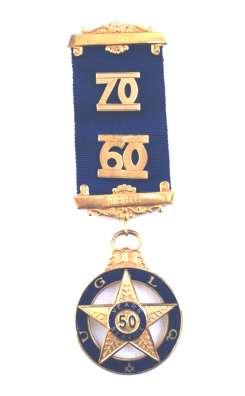 The next most important service jewels are the Long Service jewels The 50 Year Service Jewel: This jewel is awarded by the Grand Lodge, and, along with the OSM &OSB may be worn
