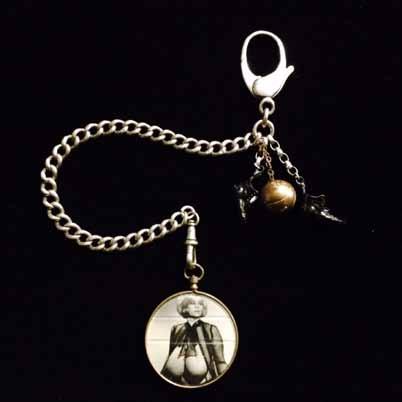 1800s) with brass basketball, sneaker charms and pinup