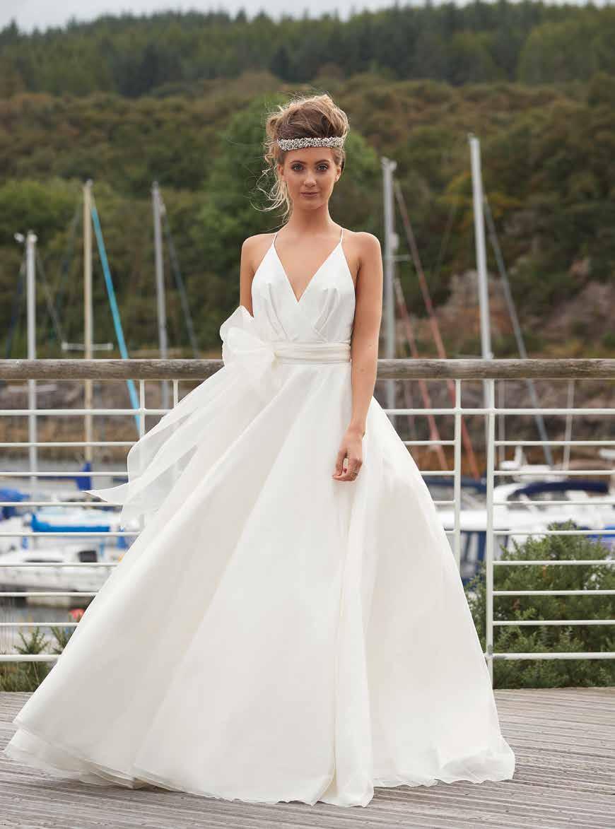 [Below] Darcy gown with bow detail and crossover straps, from 2,295, Sassi Holford.