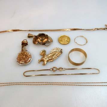 gold medallion; an English 9k band; a 10k pendant; a 14k gold and citrine pendant; etc,