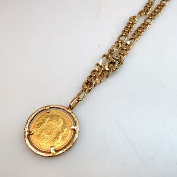 suspending a 14k yellow gold pendant set with an 1892