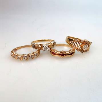 6 cm 196 2 X 10K & 2 X 14K YELLOW GOLD RINGS set with 3