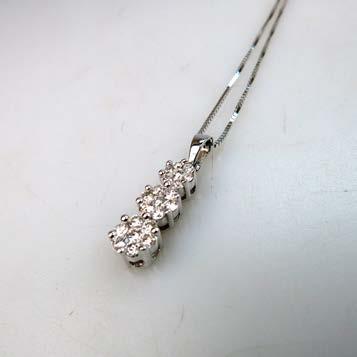 2 grams $1,800 2,400 244 14K WHITE GOLD PENDANT WITH CHAIN set