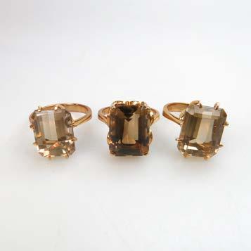 247 3 X 18K YELLOW GOLD RINGS each set with an