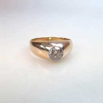 2 grams 305 10K YELLOW GOLD RING with a bezel set round brilliant diamond (approx. 0.