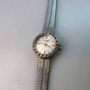 485 movement; in an 18k white gold case with an integral 18k white gold strap length 6.75 in 17.