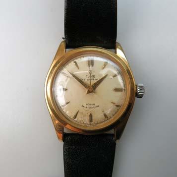 WRISTWATCH, WITH DATE 33mm; 17 jewel movement; in a 14k yellow gold case with a leather strap 327