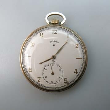 337 LORD ELGIN STEM WIND POCKET WATCH circa 1945; 14 size; 21 jewel movement adjusted to 5 positions; in a 14k yellow gold case, 48.8 grams, monogrammed to reverse; working $350 500 338 M.J.