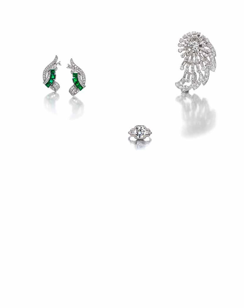 31 33 32 31 A PAIR OF DIAMOND AND EMERALD EARCLIPS, RAYMOND YARD, CIRCA 1930 of scrolled design, centrally set with squareshaped emeralds, adorned with baguette and round brilliant-cut diamonds,